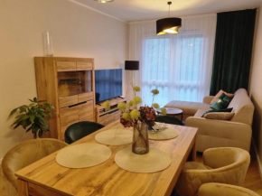 Apartament 55 z miejscem w garażu